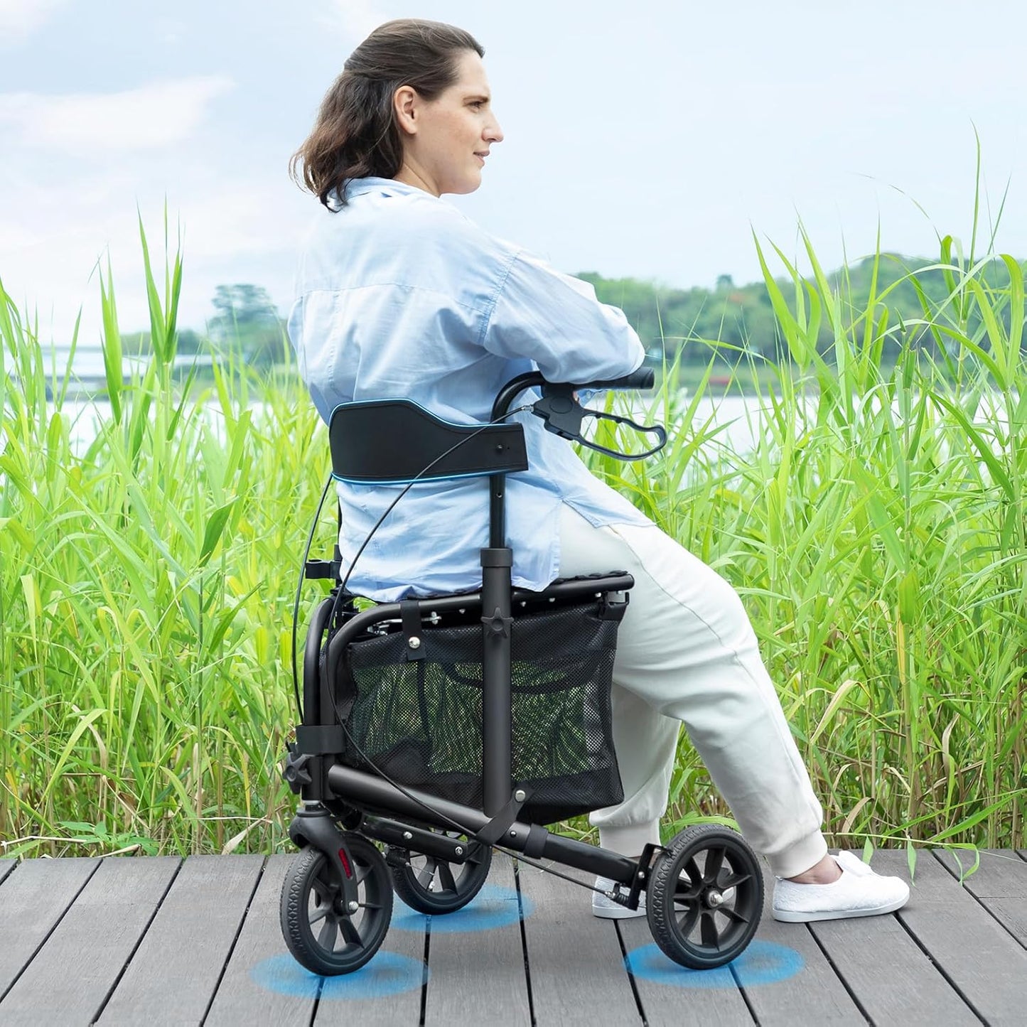 This lightweight foldable walking aid, designed for seniors, features a soft backrest seat, 8-inch wheels, and a modern aluminum frame.